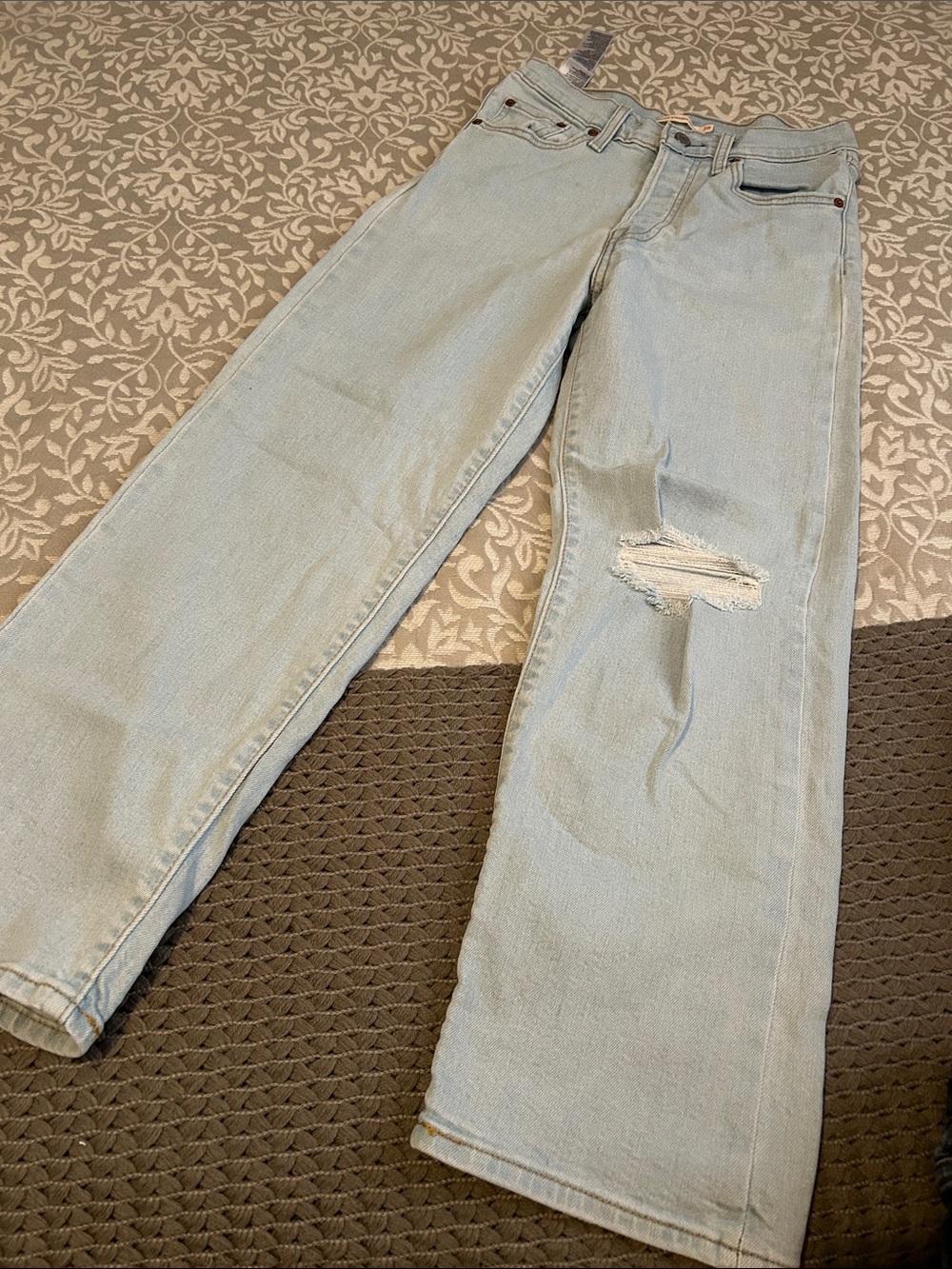 Light Wash Men’s Bootcut Jeans with Knee Distress